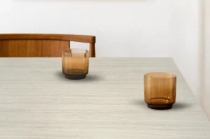 Minimalist dining tabletop featuring a durable NewMika HPL surface.