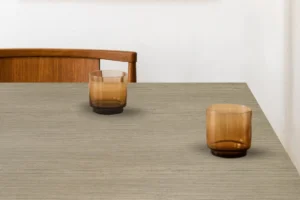 Minimalist dining tabletop featuring a durable NewMika HPL surface.