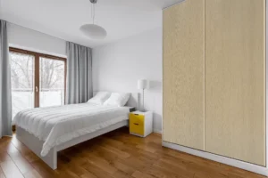 Sleek and modern wall cabinets finished with premium NewMika HPL sheets in a modern interior.