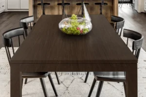 Minimalist dining tabletop featuring a durable NewMika HPL surface.