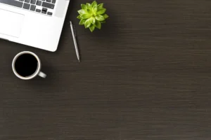Minimalist dining tabletop featuring a durable NewMika 3288 Wild Walnut CHW HPL surface.