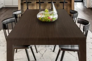 High-pressure laminate tabletop from New Mika 3288 Wild Walnut SUD HPL, showcasing a sophisticated surface with a realistic wood-grain or solid-color finish. The HPL surface provides scratch resistance, heat resistance, and easy cleanability, making it ideal for desks, dining tables, or conference tables in hotels, offices, and schools.